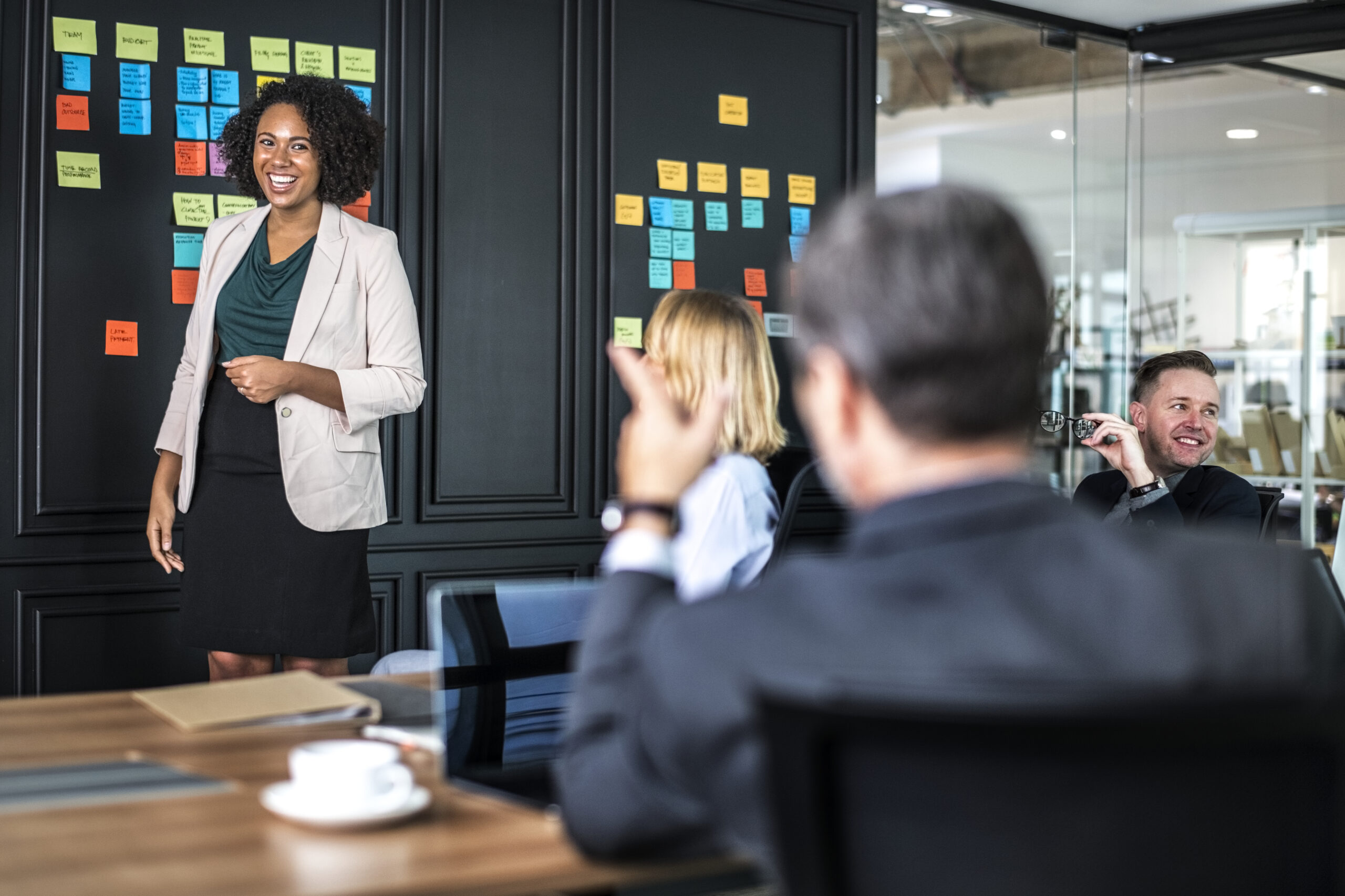 People collaborating in a facilitated business discussion